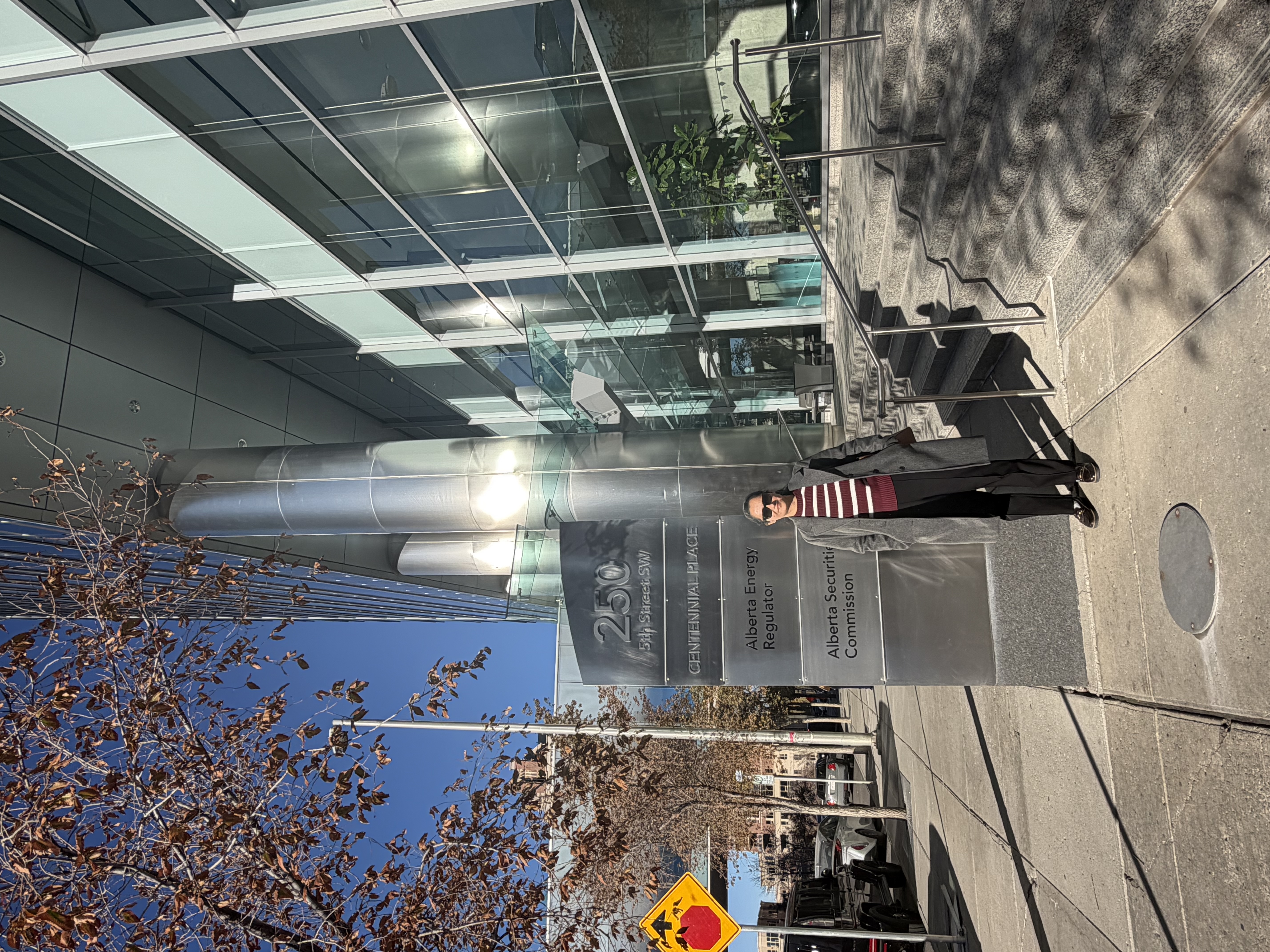 Mitali Sharma outside the Alberta Energy Regulator office at Centennial Place, Calgary